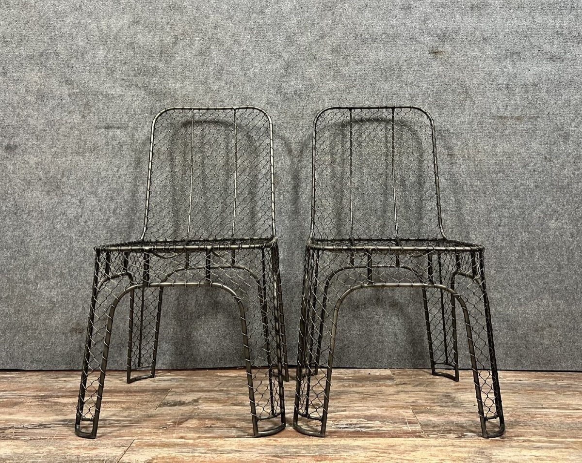paire de chaises design industriel en fer tressé vers 1980